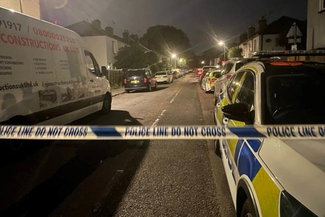 <p>Police in Bremer Road, Staines (Ted Hennessey/PA)</p>